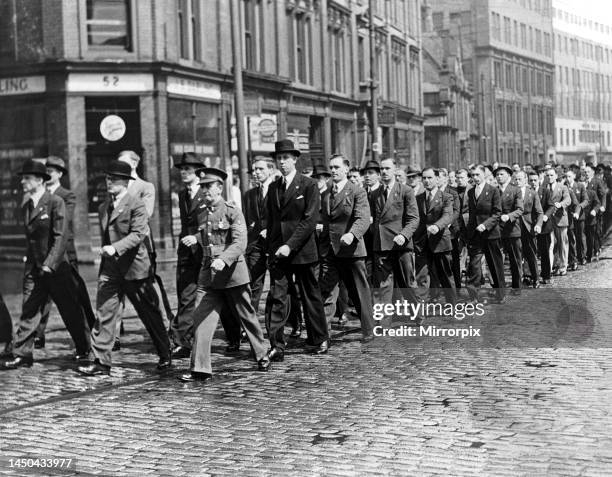 World War Two . British Army recruits march in the parade to St Thomas's Church, Newcastle. The old soldier in the parade was formerly of the Tyne...
