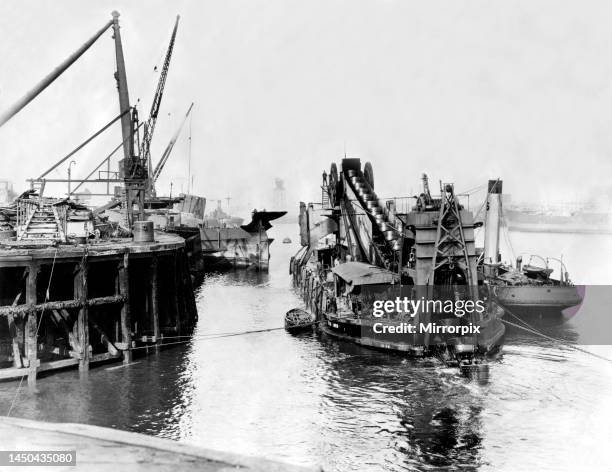 Preparing the RMS Olympic berth. A dredger at work deepening the berth at Palmers Shipbuilding and Iron Company's Jarrow yard, owned by T W Ward Ltd....