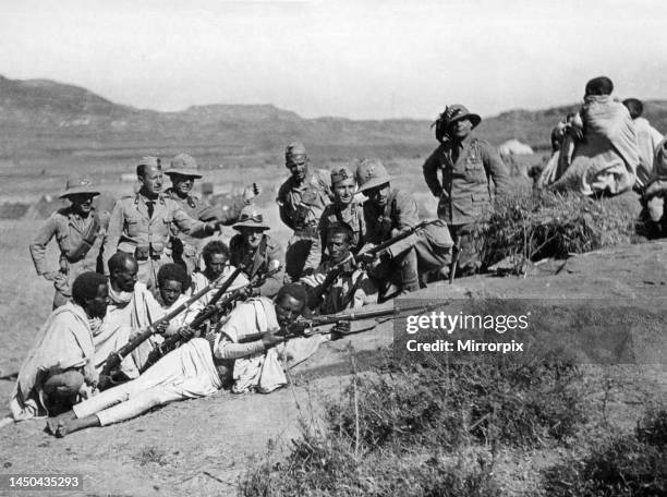 Abyssinian War October 1935Auxiliary soldiers who surrendered with Ras Desta receiving musketry instruction from Italian soldiers at Adigrat.