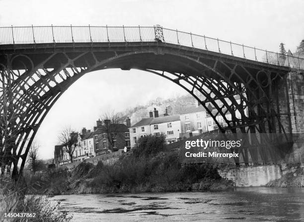 The famous iron bridge which crosses the River Severn at Ironbridge, Shropshire. 4th December 1964.