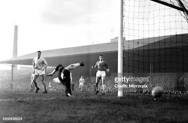 Manchester United goalkeeper Harry Gregg saves again during a Manchester City attack in their league matchJanuary 1960.