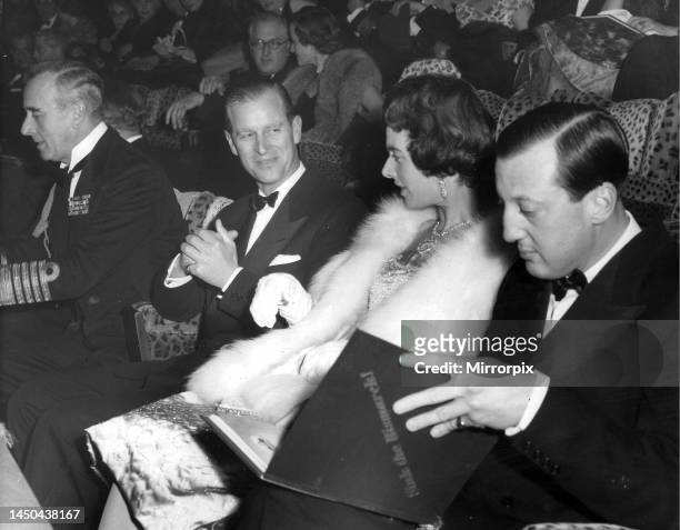 Prince Phillip at the cinema with left to right, Earl Mountbatten, Prince Phillip, Lady Brabourne and Lord Brabourne, attending the premiere of 'Sink...