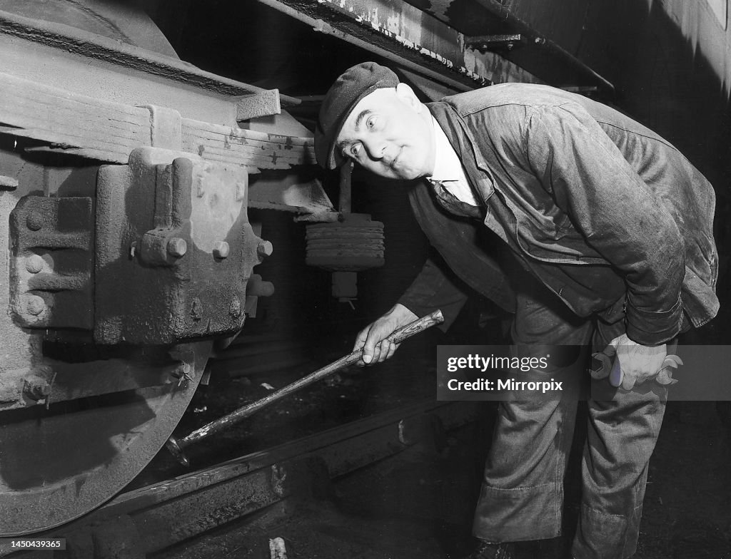 Train Wheeltapper Wheel Tapper Bill Warden seen here walking the length of his train ...