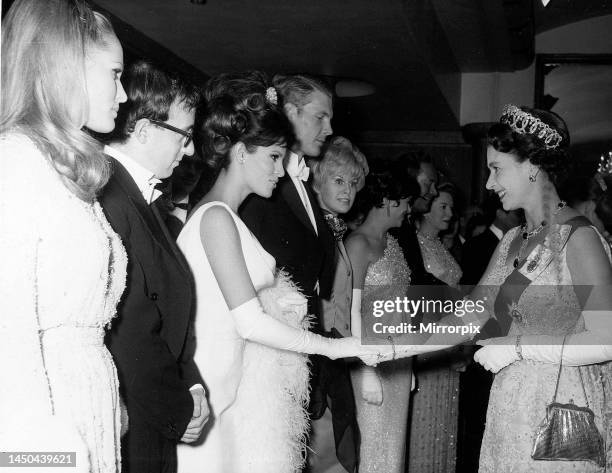 Raquel Welch, Woody Allen and Ursula Andress meet Queen Elizabeth. 14th March 1966.