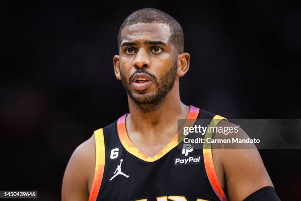 Chris Paul of the Phoenix Suns looks on against the Houston Rockets during the first half at Toyota Center on December 13, 2022 in Houston, Texas....