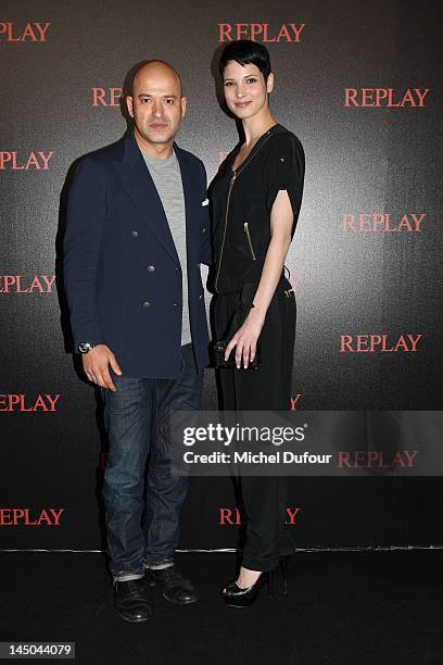 Matteo Sinigaglia and Hanaa Ben Abdesslem attend the Replay & Simple Minds Concert at Hotel Martinez on May 22, 2012 in Cannes, France.