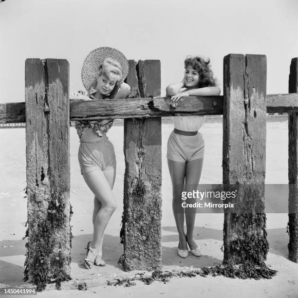 Having holiday fun in the sun at Minnis Bay near Margate, Kent are Beverley Bennett, aged 18, and Ingrid Young, age 16. Both girls are actresses at...