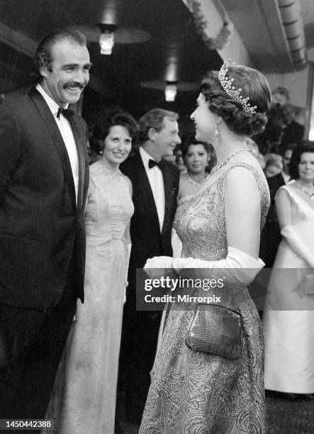 Sean Connery meets Queen Elizabeth II at the premiere of the new James Bond film You Only Live Twice. 12th June 1967.