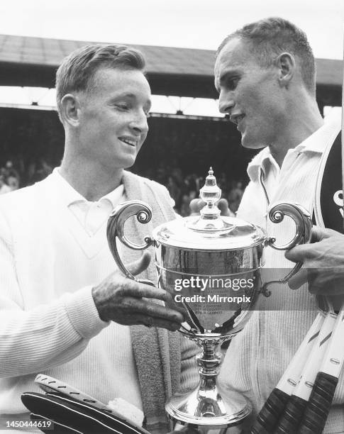 Neale Fraser wins men's singles title at Wimbledon 1960. With opponent Rod Laver holding trophy.