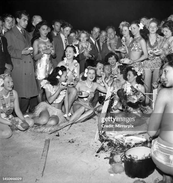 Felix Mendelssohn holds midnight beach party for Pulu Moe who has been with his band for 15 years. August 1950.