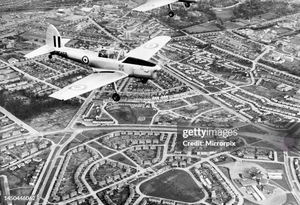 An aerial view of the Northfield Housing Estate in Aberdeen, Scotland showing a De Havilland DHC-1 Chipmunk flying overhead. Circa 1950.