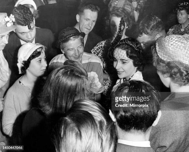 Elizabeth Taylor meets the press at the Empire Theatre. June 1950.