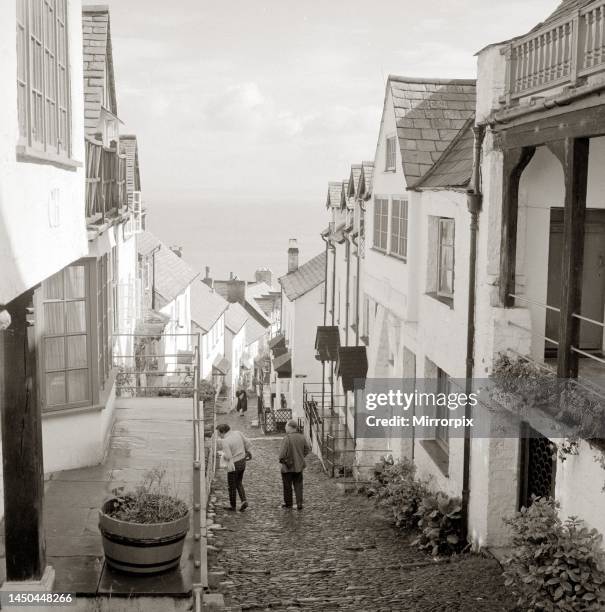 Tourists making their way down the steep hill in the village of Clovelly in North Devon circa 1950s.