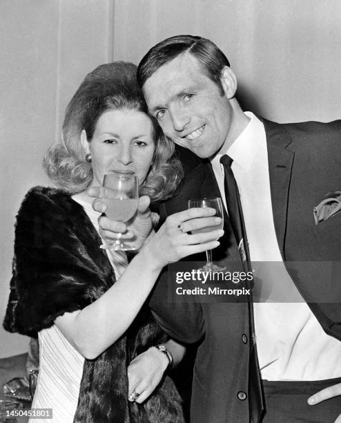 Jeff Astle and wife toasting each other at a reception after West Bromwich Albion defeated Everton 1-0 in the FA Cup Final at Wembley Stadium. 18th...