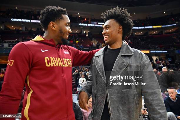 Donovan Mitchell of the Cleveland Cavaliers talks to Collin Sexton of the Utah Jazz after the game at Rocket Mortgage Fieldhouse on December 19, 2022...