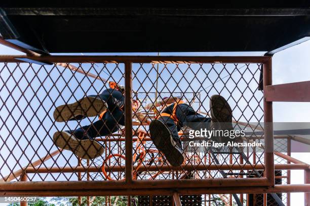 rescuers on the scaffold - occupational health and safety stock pictures, royalty-free photos & images