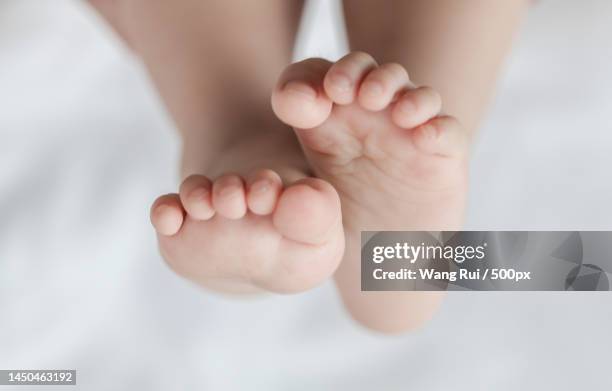 two little feet - image stock pictures, royalty-free photos & images