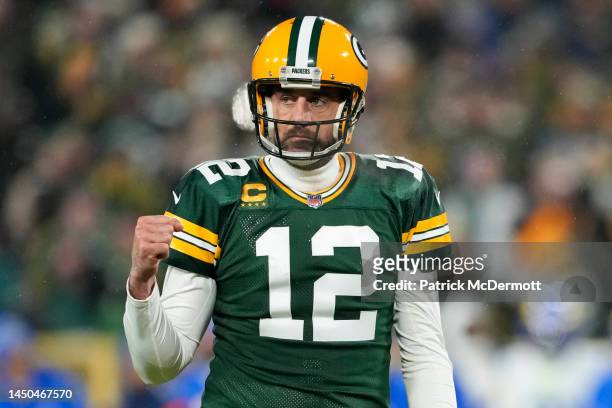 Aaron Rodgers of the Green Bay Packers reacts after a touchdown against the Los Angeles Rams at Lambeau Field on December 19, 2022 in Green Bay,...