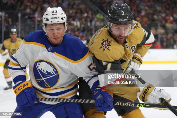 Jeff Skinner of the Buffalo Sabres battles Alex Pietrangelo of the Vegas Golden Knights during the first period at T-Mobile Arena on December 19,...