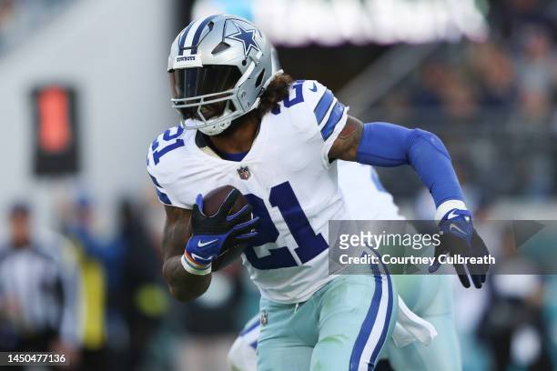 Ezekiel Elliott of the Dallas Cowboys carries the ball during the second half against the Jacksonville Jaguars at TIAA Bank Field on December 18,...