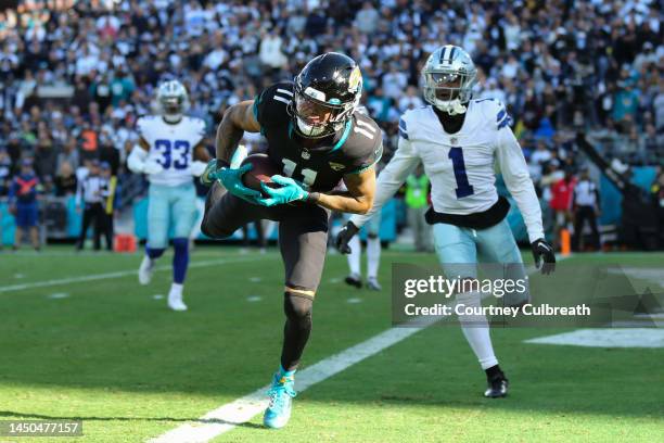 Marvin Jones Jr. #11 of the Jacksonville Jaguars catches a touchdown pass during the second half against the Dallas Cowboys at TIAA Bank Field on...