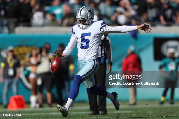 Bryan Anger of the Dallas Cowboys punts the ball during the first half against the Jacksonville Jaguars at TIAA Bank Field on December 18, 2022 in...