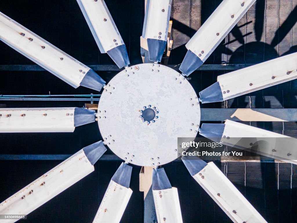 Aerial view/A steam turbine is a device or machine that uses high pressure steam to drive a turbine to rotate around a shaft to generate electricity in a power plant.
