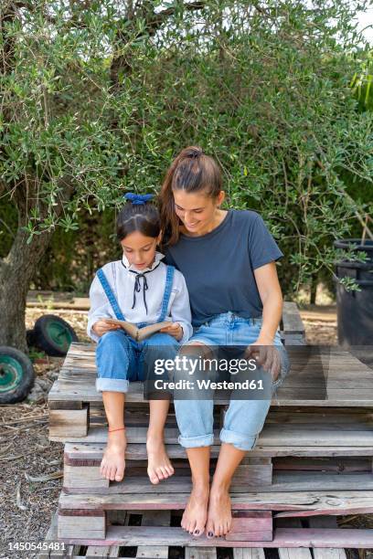 Child Ripping Book Child Ripping Book Photos and Premium High Res Pictures - Getty Images
