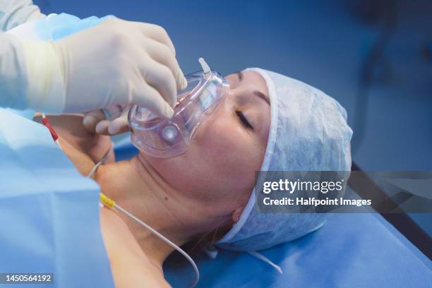 close-up of mature patient during operation. - oxygen stock pictures, royalty-free photos & images