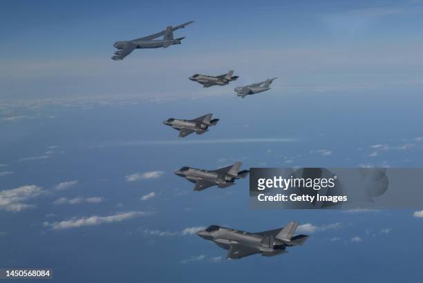 In this handout image released by the South Korean Defense Ministry, A U.S. B-52H strategic bomber, C-17 and South Korean Air Force F-35 fighter jets...