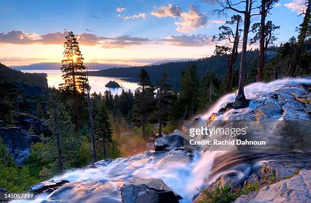 a beautiful sunrise at eagle falls at emerald bay in lake tahoe, california. - lake tahoe fotografías e imágenes de stock