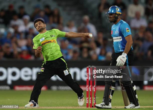 Fazalhaq Farooqi of the Thunder during the Men's Big Bash League match between the Adelaide Strikers and the Sydney Thunder at Adelaide Oval, on...