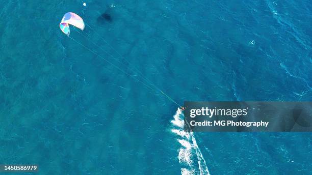 aerial top view of a kite surfer on a autumn day at el medano beach, tenerife (canary islands) - tenerife sea stock pictures, royalty-free photos & images