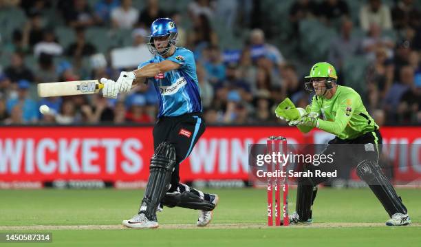 Matt Short of the Strikers and Matthew Gilkes of the Thunder during the Men's Big Bash League match between the Adelaide Strikers and the Sydney...