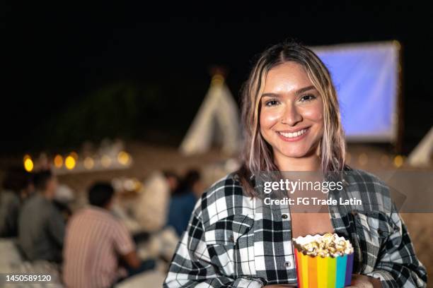 portrait of young woman at the outdoors cinema - venezuelans stock pictures, royalty-free photos & images