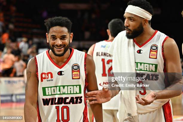 Corey Webster of the Wildcats reacts with Tashawn Thomas after the round 11 NBL match between Cairns Taipans and Perth Wildcats at Cairns Convention...