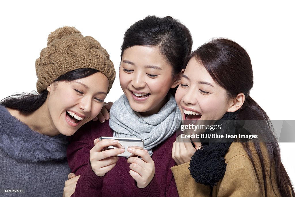 Young women using mobile phone