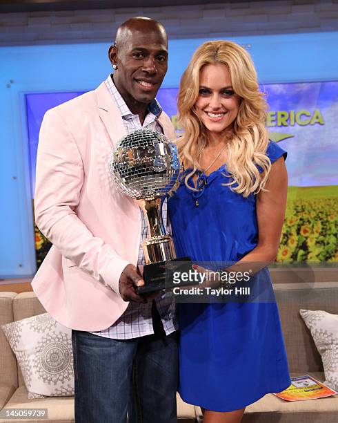 Dancing With The Stars" winners Peta Murgatroyd and Donald Driver pose with the champions' mirrorball trophy on ABC's "Good Morning America" in Times...