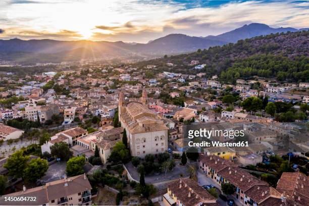 parroquia sant joan baptista church amidst houses in calvia municipality - majorca stock pictures, royalty-free photos & images