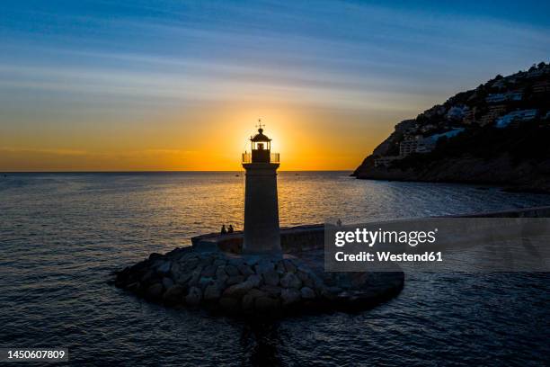 faro de port d' andratx at sunset, balearic islands, spain - lighthouse mallorca stock pictures, royalty-free photos & images