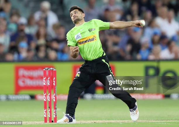 Fazalhaq Farooqi of the Thunder during the Men's Big Bash League match between the Adelaide Strikers and the Sydney Thunder at Adelaide Oval, on...