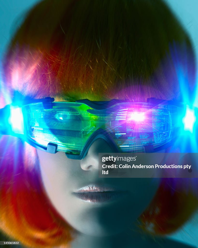 Futuristic Pacific Islander woman wearing digital eyeglasses