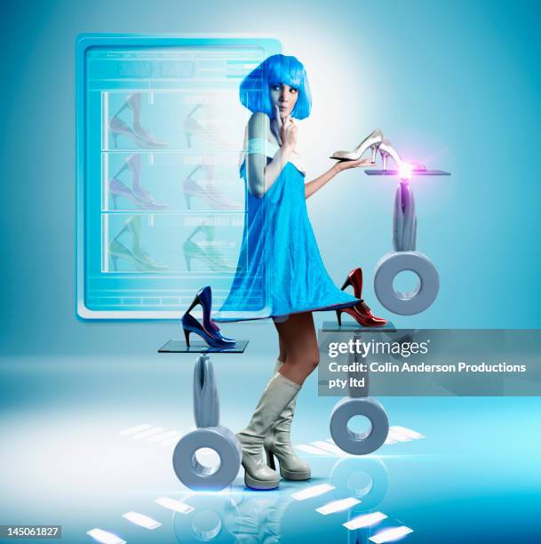 futuristic pacific islander woman looking at shoes - hologram display stock pictures, royalty-free photos & images