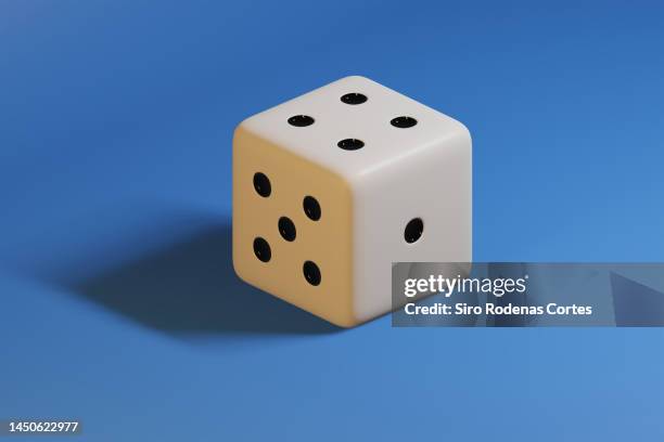 3d white dice on blue background - dice stockfoto's en -beelden