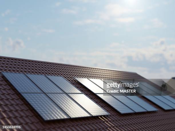 solar panels on household roof - solar farm stockfoto's en -beelden