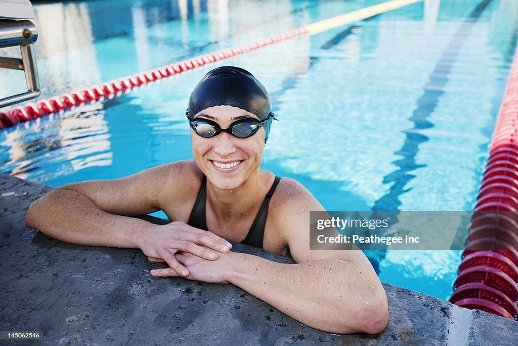 Competitive swimmer in swimming pool