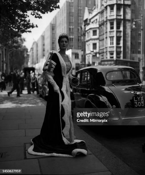 Miss Fiona Campbell Walter wears baroness coronation robe under which she wears an actual Queen Alexandra dress at the Mayfair Hotel fashion show....