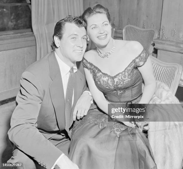 Rock Hudson with actress Yvonne De Carloin in London. August 1952.