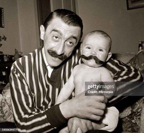 Actor Mario Fabrizi with his five month old baby son Anthony. 26th November 1961.