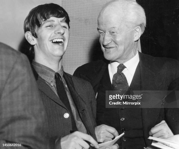 Year old Ted shares a joke with Beatles drummer Ringo Starr during rehearsal break. Circa 1964.